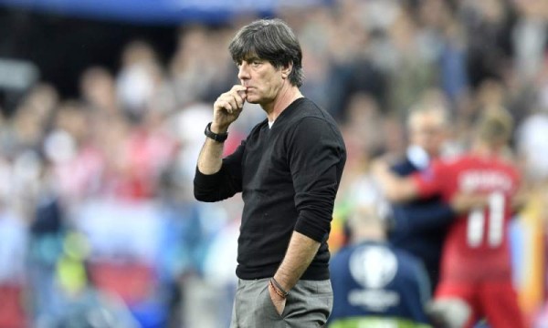 Germany coach Joachim Loew looks on from the sidelines during the Euro 2016 Group C soccer match between Germany and Poland at the Stade de France in Saint-Denis, north of Paris, France, Thursday, June 16, 2016. (AP Photo/Martin Meissner) ORG XMIT: PW173