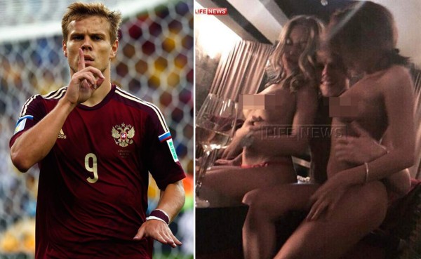 Futbolista ruso Alksandr Kokorin es fotografiado con dos strippers