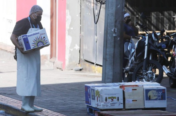 Negocios se preparan para abrir este lunes en la llamada 'reactivación de la economía en Honduras”