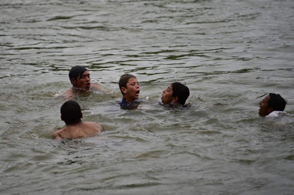 FOTOS: Sufrimiento y cansancio, así va la caravana de migrantes de hondureños