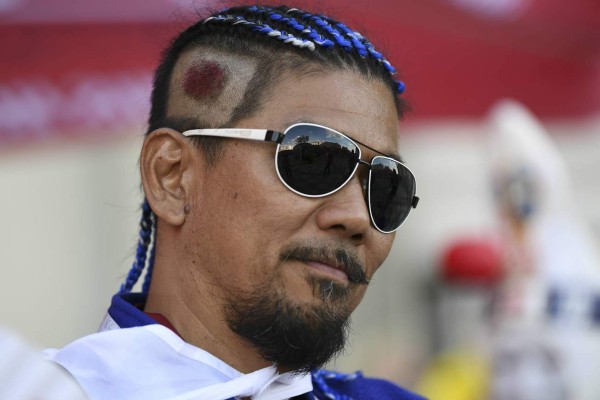 Dos culturas diferentes, una sola pasión: Hinchas de Senegal y Japón engalanaron el partido