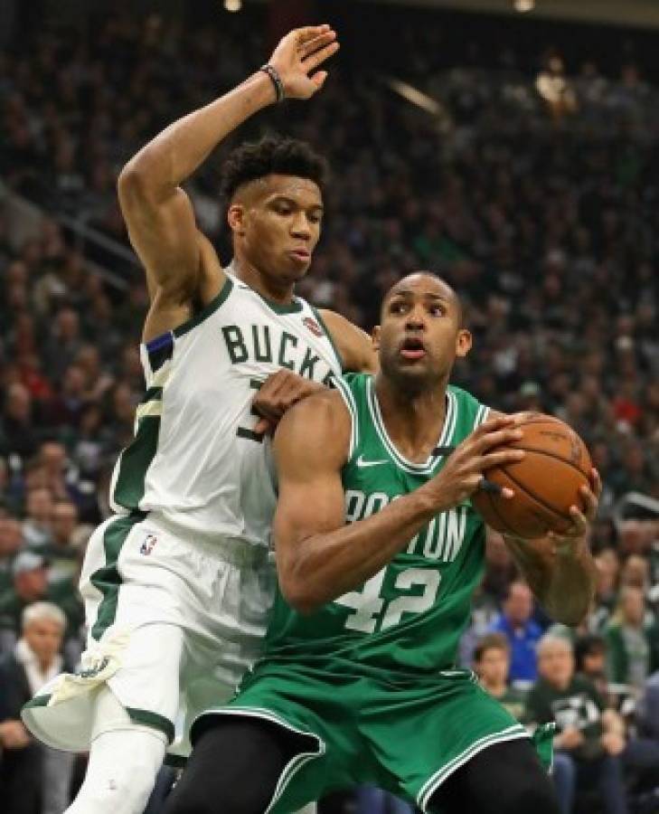 Al Horford #42 of the Boston Celtics tries to get off a shot against Giannis Antetokounmpo #34 of the Milwaukee Bucks at Fiserv Forum on May 08, 2019 in Milwaukee, Wisconsin. NOTE TO USER: User expressly acknowledges and agrees that, by downloading and or using this photograph, User is consenting to the terms and conditions of the Getty Images License Agreement. Jonathan Daniel/Getty Images/AFP