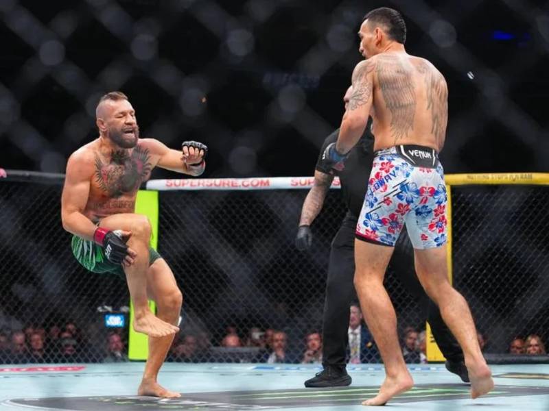 Conor McGregor sufrió una grave lesión y cayó ante Holloway en un insólito final en UFC 329.