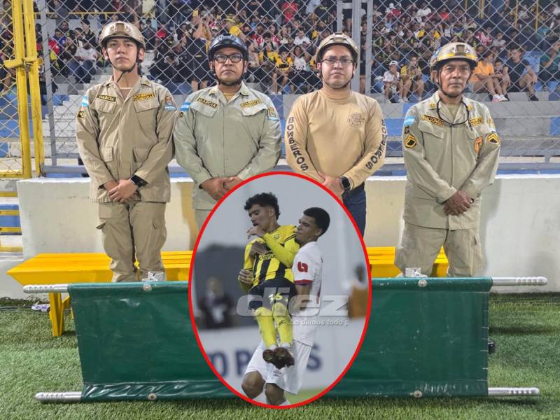 Los miembros del cuerpo de bomberos durante el partido entre Real España y Olimpia en el estadio Morazán.