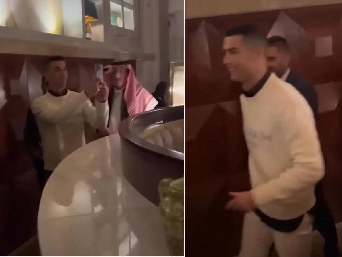 Cristiano Ronaldo también sacó su celular en el restaurante mientras todos los filmaban.